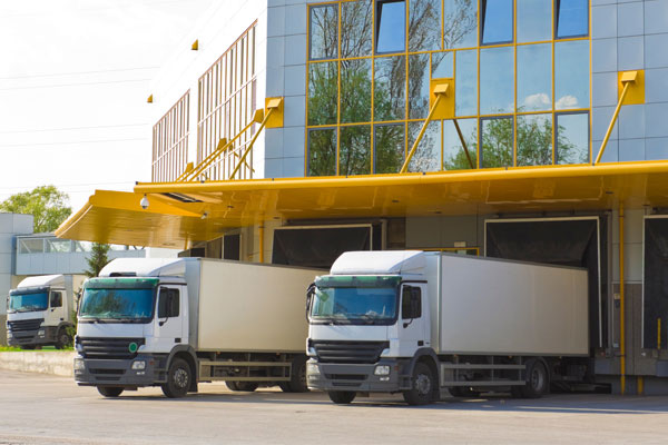 Lorries at warehouse entrance